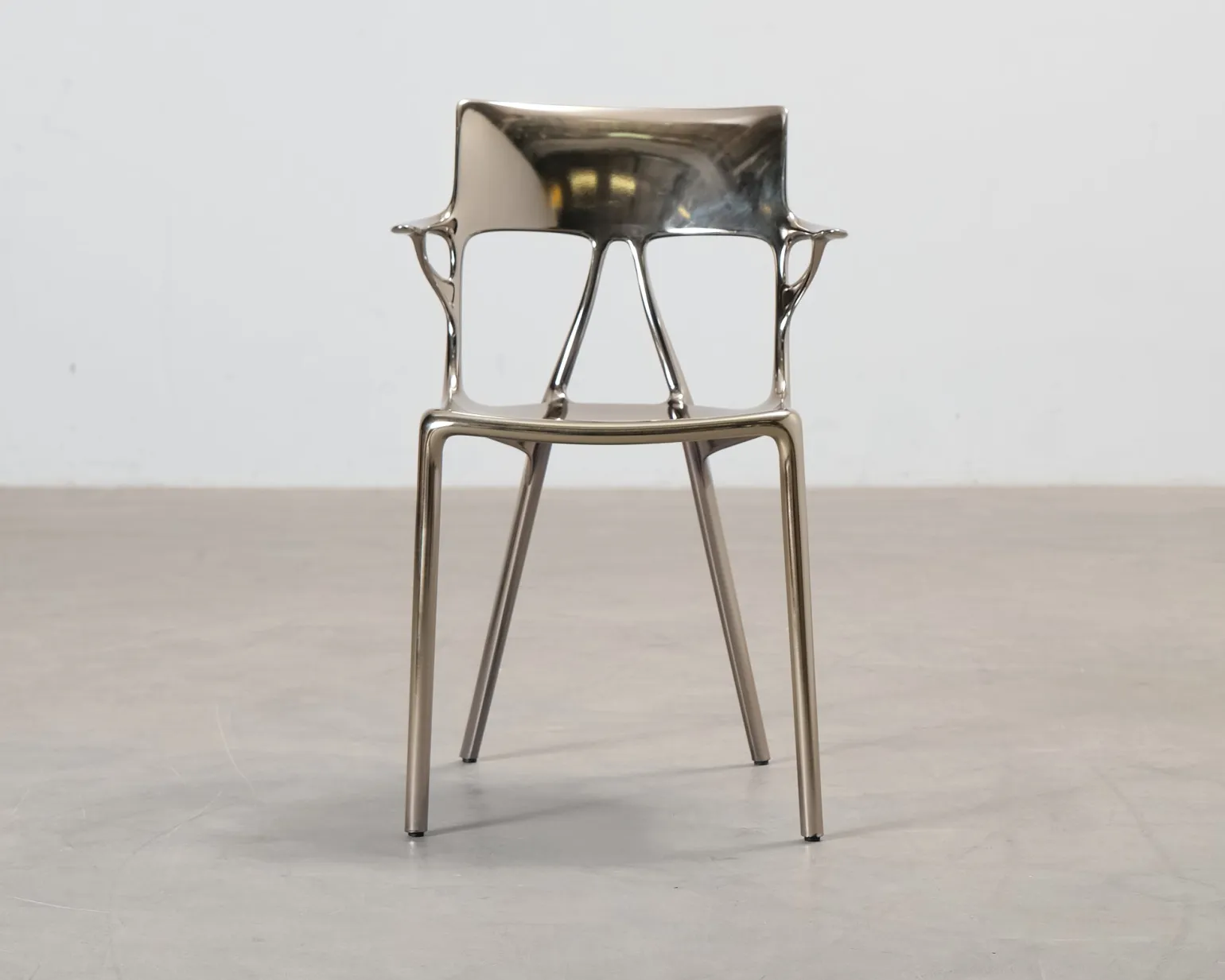 Kartell A.I. Metal stol brons
