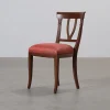 Matstol i trä och röd sits