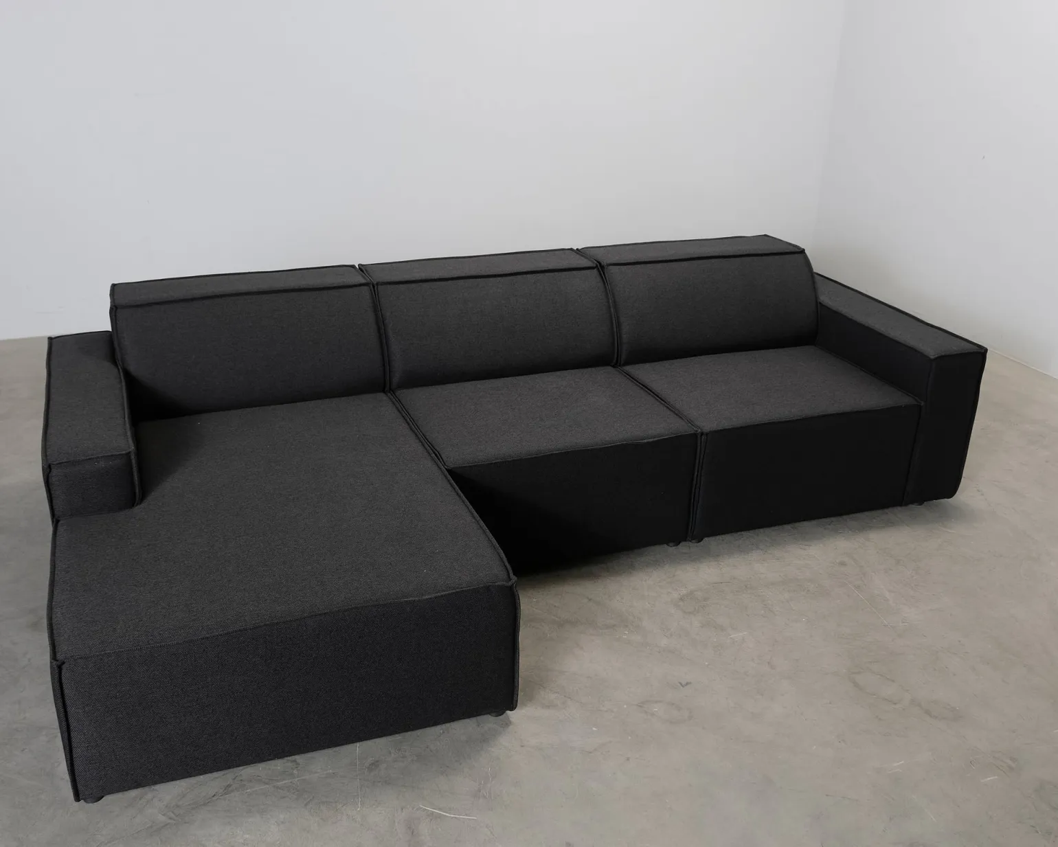 Micadoni Jodie 4-sits divansoffa grå