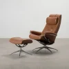 Stressless reclinerfåtölj med fotpall brunt läder