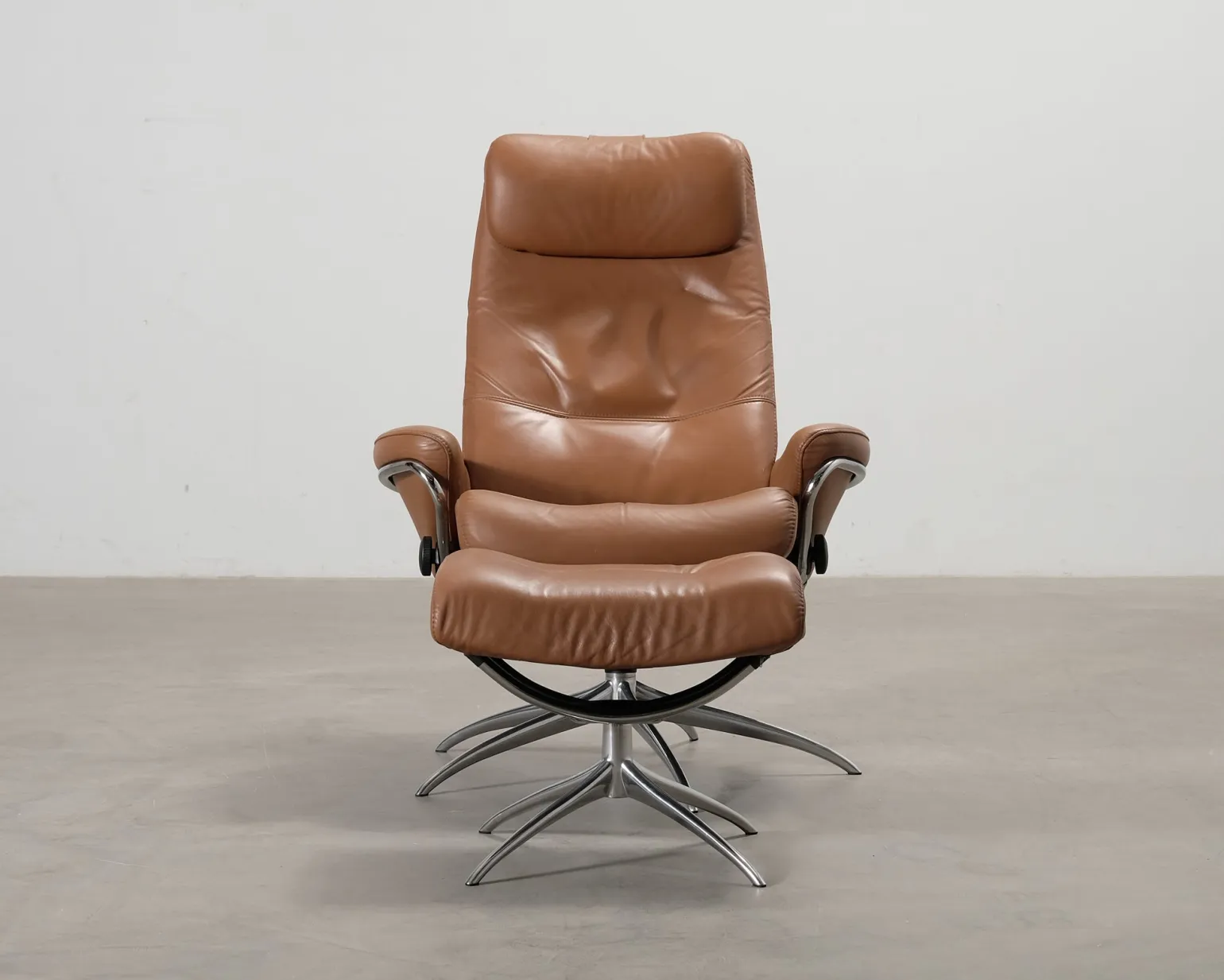 Stressless reclinerfåtölj med fotpall brunt läder