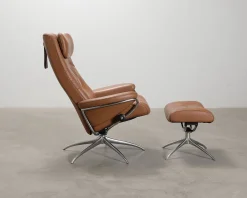 Stressless reclinerfåtölj med fotpall brunt läder