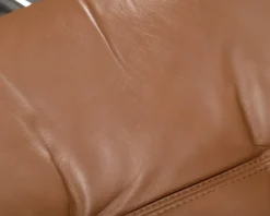 Stressless reclinerfåtölj med fotpall brunt läder