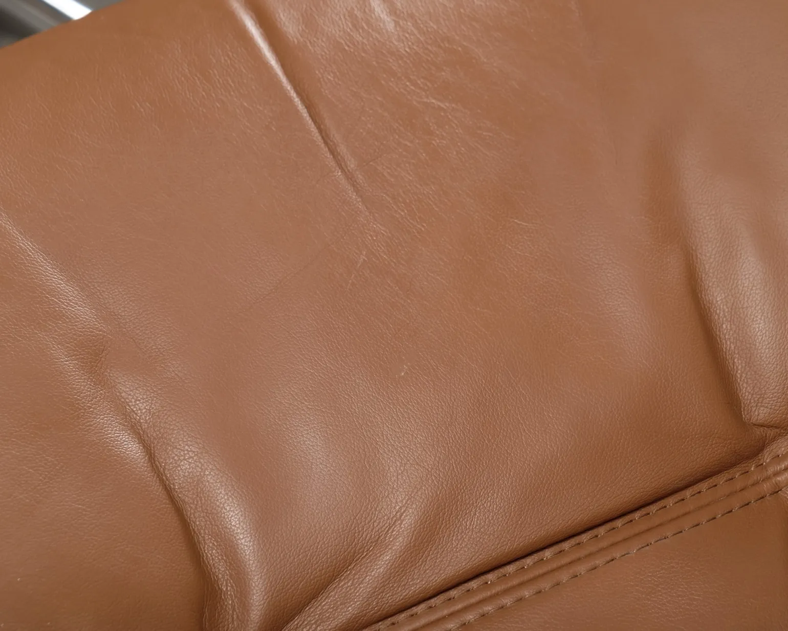 Stressless reclinerfåtölj med fotpall brunt läder