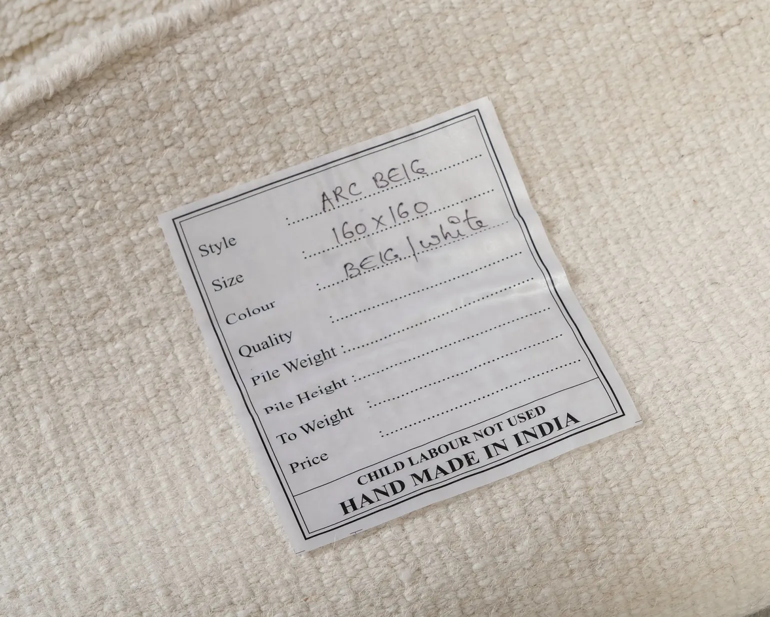 Woven Works Arc ullmatta ø 160 cm vit / beige
