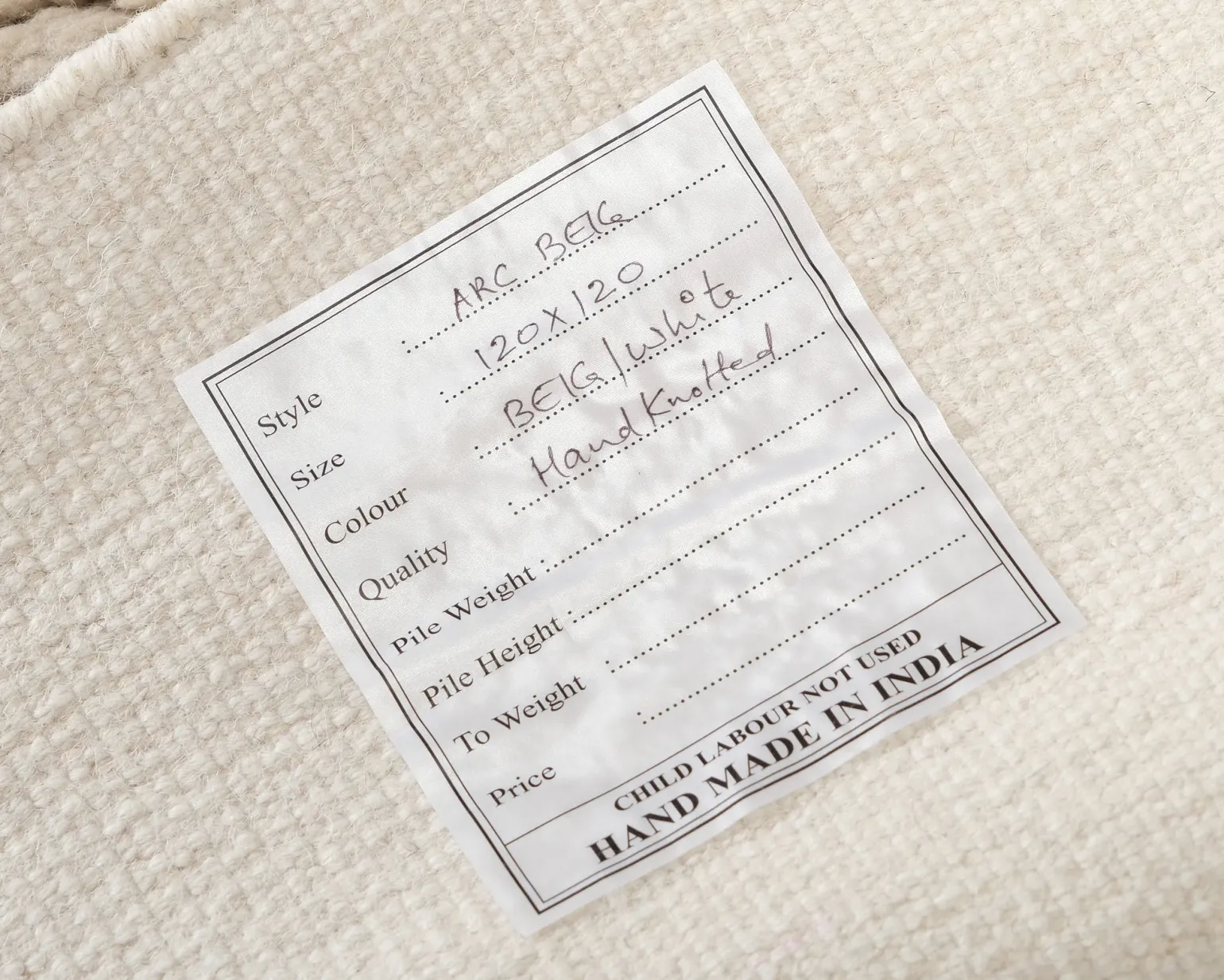 Woven Works Arc ullmatta ø 120 cm vit / beige